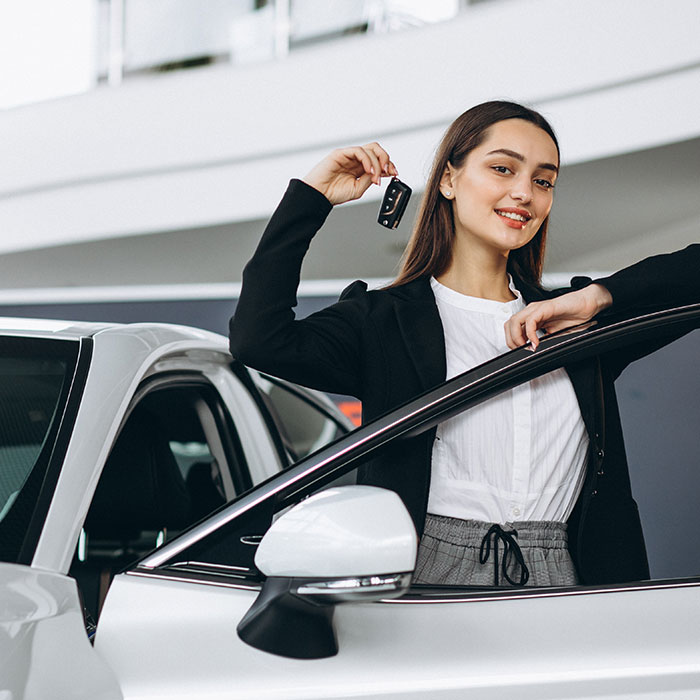 woman-choosing-car-car-showroom